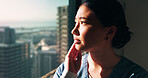 Nurse, sad and woman with thinking at window for patient loss, process trauma and bad news. Healthcare professional, asian person or unhappy in clinic for medical crisis, hospital grief or reflection