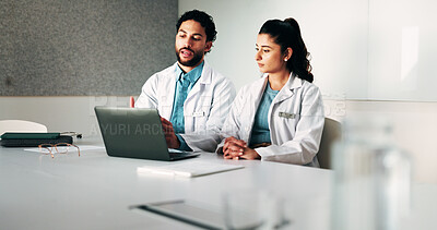 Buy stock photo Doctors, team and laptop with planning at hospital in boardroom, review and discussion for healthcare. People, medical professional and meeting with computer, feedback or services at wellness clinic