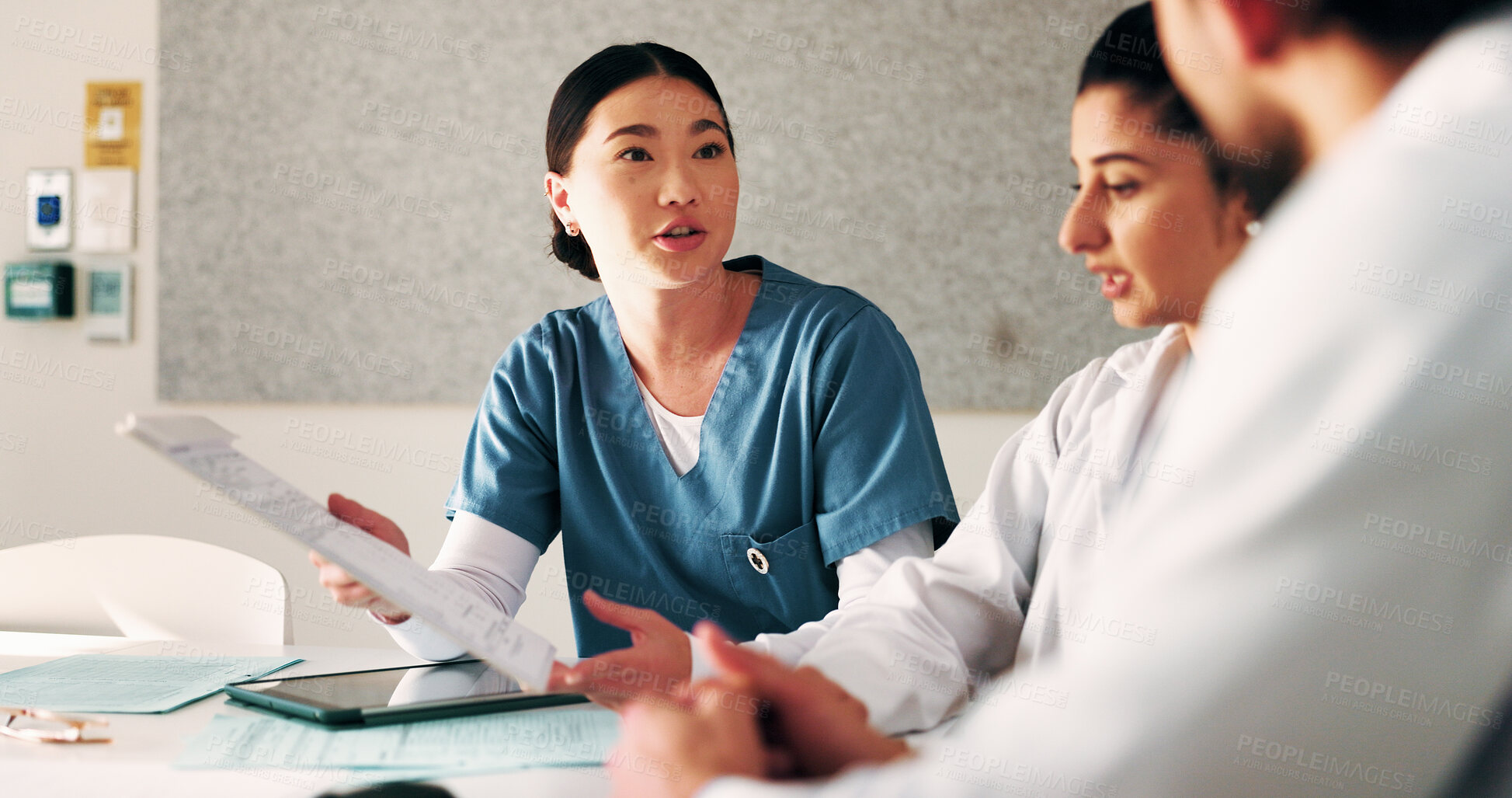Buy stock photo Doctors, nurse and clipboard for meeting at hospital in boardroom, notes or planning for healthcare. People, medical professional and team with tech, feedback or talk for wellness services at clinic