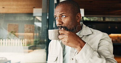 Buy stock photo Coffee, reflection and window with black man in home for inspiration, memories or nostalgia. Drinking, thinking and view with mature person in modern apartment for contemplation, remember or vision
