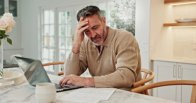 Buy stock photo Man, laptop and stress in home with documents for finance, inflation budget or mistake in kitchen. Tech, mature person or checking invoice with expensive bill for debt review or tax increase in house