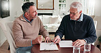 Man, meeting and advisor in home with documents, finance report and form for loan application. Mature people, consultant and reading at house with paperwork, financial clipboard and retirement policy