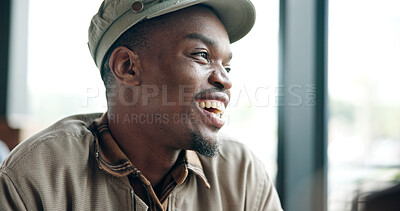 Buy stock photo Morning, thinking and black man in coffee shop for laughing, funny memory and positive mood. Happy, restaurant and person with reflection, thoughtful and remember joke, humor and break on weekend