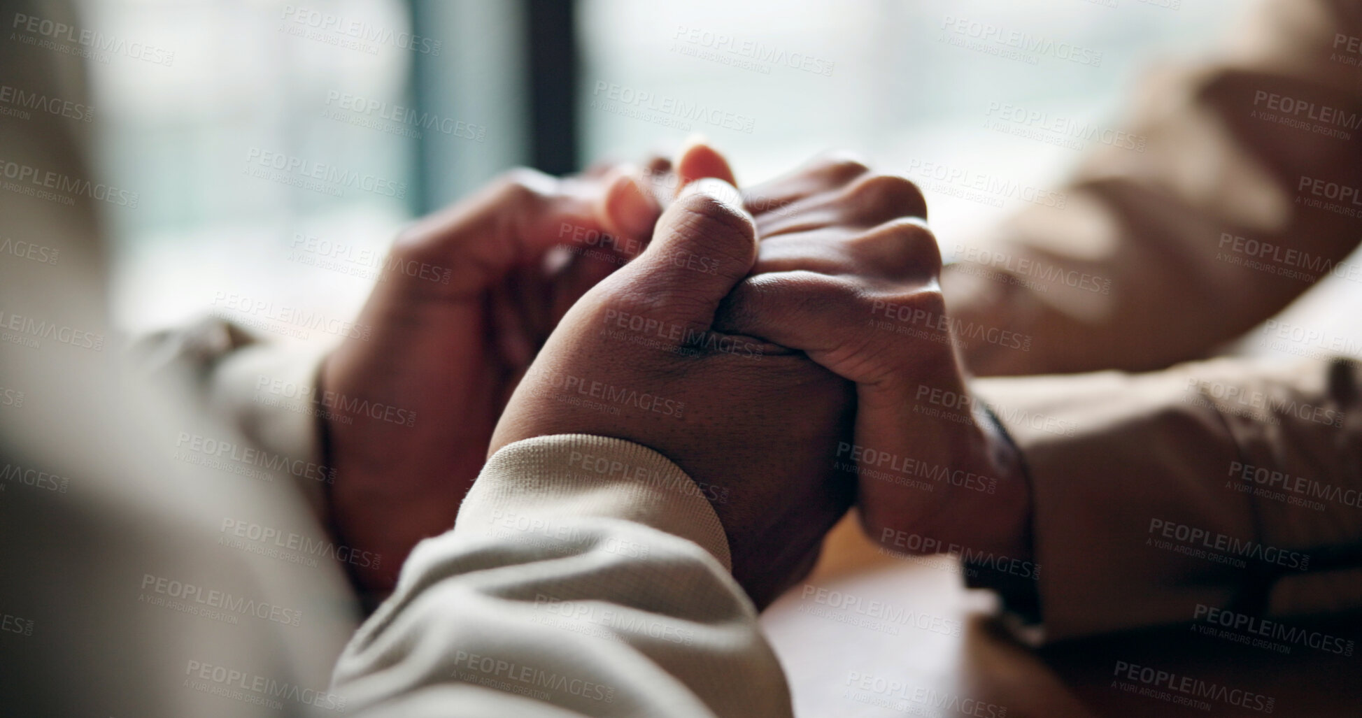Buy stock photo Couple, love and holding hands with connection in romantic relationship, cafe and security or care. People, together and gesture for commitment, support and understanding or trust in partner on date