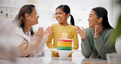 Buy stock photo Grandmother, child and mom clap with birthday cake for generations bonding, love and support for growth. Happy, grandma and parent in home with girl, applause and dessert for special day celebration.