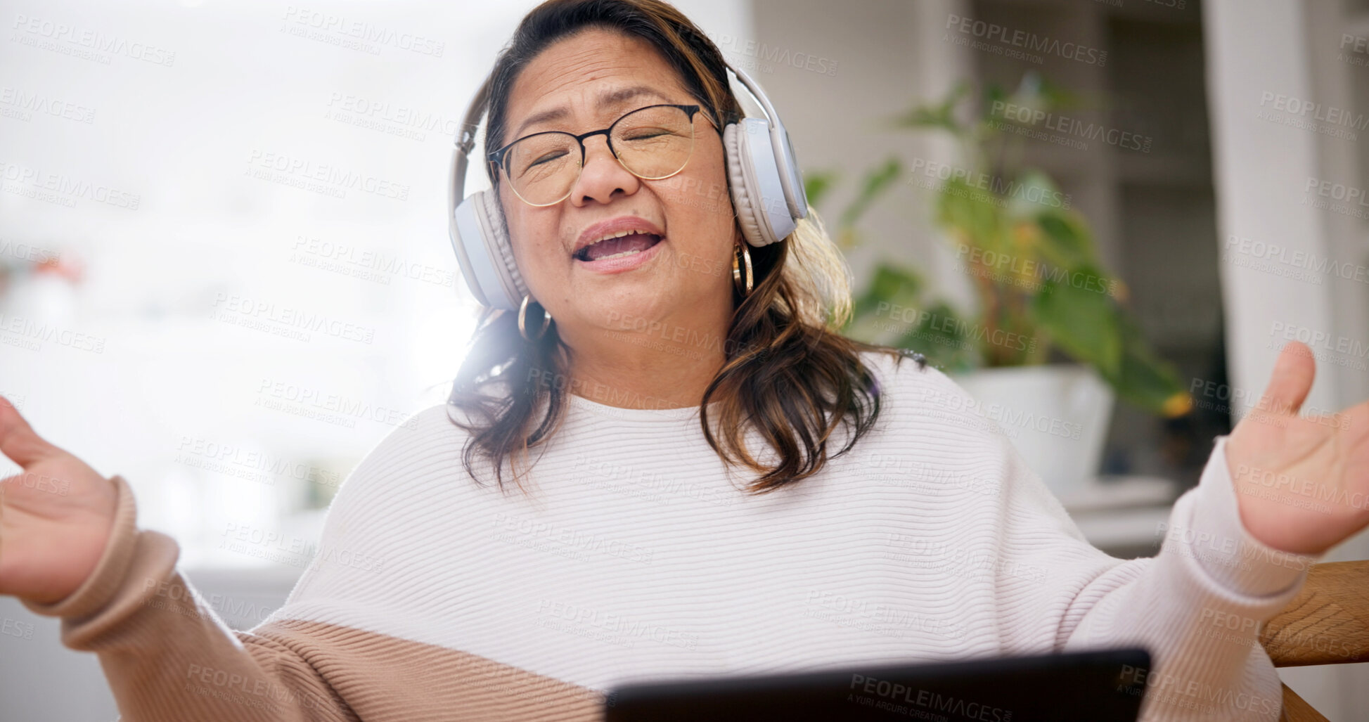 Buy stock photo Singing, headphones or woman in home with streaming, song connection or listening to music playlist. Online, tech or senior person with eyes closed, sound track or radio subscription on audio app.