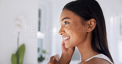 Buy stock photo Skincare, check and woman with smile in bathroom, glow and cosmetics for healthy skin and hydration. Self care, home and Indian person with pride, confident and beauty with dermatology benefits