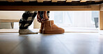 Morning, shoes and person with slippers in bedroom for waking up, routine and relax in home. Bed, comfort and feet of woman with soft pajamas, footwear and weekend or winter holiday with break