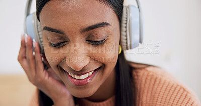 Buy stock photo Happiness, headphones and woman in home, listening to music and digital app for live streaming. Apartment, smile and person in lounge, radio and relax with online comedy, podcast and funny audio