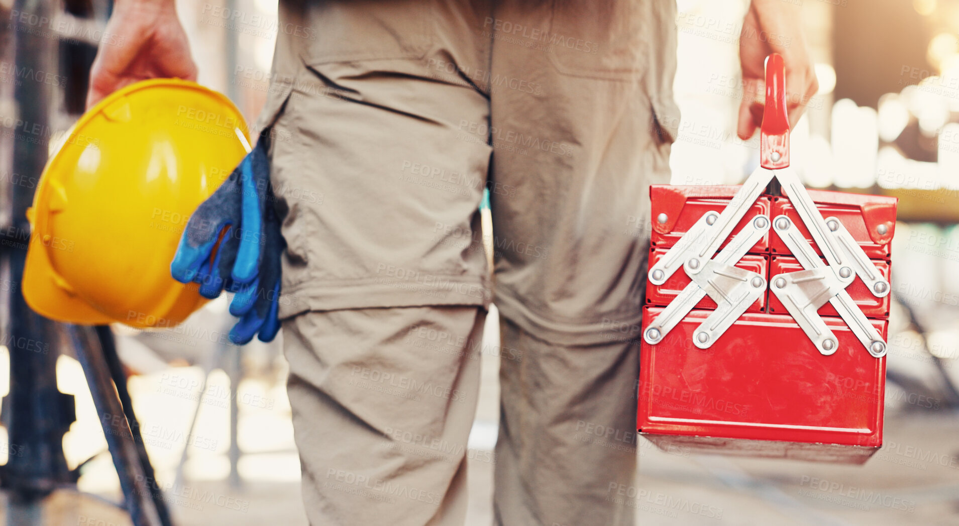 Buy stock photo Hand, toolbox and man with helmet for safety, construction site or building project. Back, person and maintenance with hard hat for protection, engineering compliance or inspection for renovation