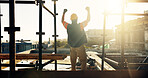 Back, construction site and man with celebration for foundation finish, inspection pass or support. Sunset, flare and excited person with fist pump for building progress, compliance success and cheer