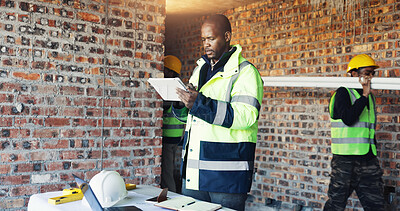 Buy stock photo Engineer, reading and man tablet for construction, inspection and research for renovation. Male person, review and digital with team for architecture, building expansion and information for project