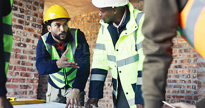 Buy stock photo Engineer, architect and team in meeting for discussion, update and planning at construction site. Men, group collaboration and project or floor plan for renovation, expansion or building process