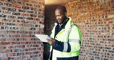 Buy stock photo Architect, reading and black man with tablet for construction, research and report for renovation. Person, review and digital at site for architecture, building expansion and information for project