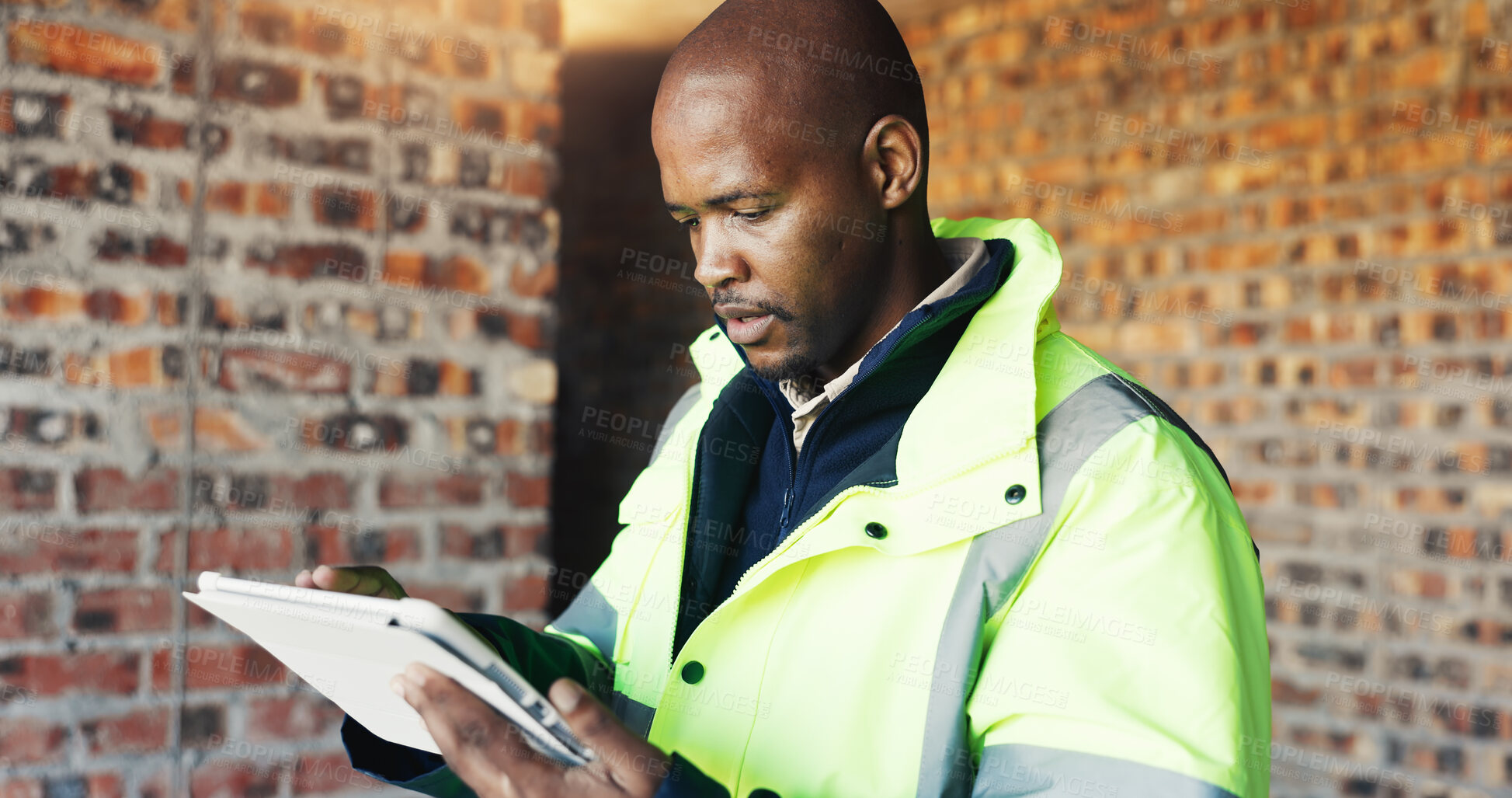 Buy stock photo Serious, engineer and black man with tablet for construction, research and report for renovation. Person, reading and digital at site for architecture, building expansion and information for project