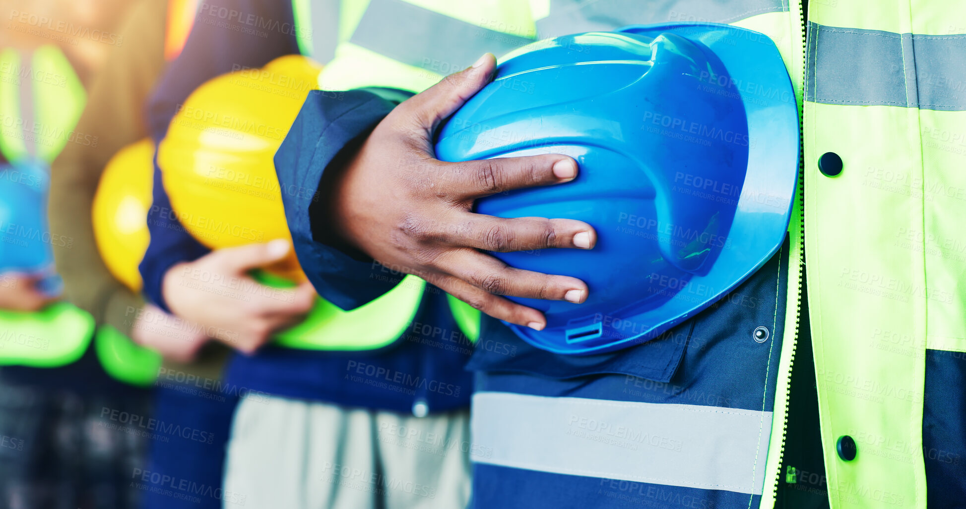 Buy stock photo Construction, hands and group in row with helmet for labor safety, site inspection or policy meeting. Line, people and waiting with hard hat for team briefing, workplace compliance or maintenance ppe