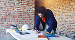 Architect, writing and man with blueprint for construction, design and layout for renovation. Male person, pc and document with drawing for architecture, building expansion and floor plan for project
