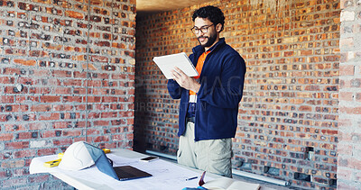Buy stock photo Smile, engineer and man with tablet for construction, research and information for renovation. Person, reading or digital at site for architecture, building expansion and online blueprint for project