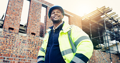 Buy stock photo Man, engineer and low angle with thinking in city, helmet and urban development at construction site. Mature person, architect and perspective for project with infrastructure inspection and solution