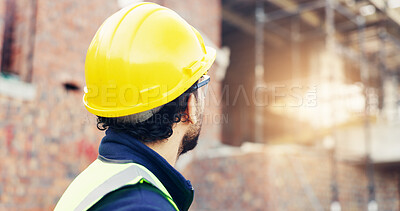 Buy stock photo Architect, man and helmet with building inspection on construction site for safety regulations. Male person, contractor or civil engineer checking infrastructure for architecture project or security