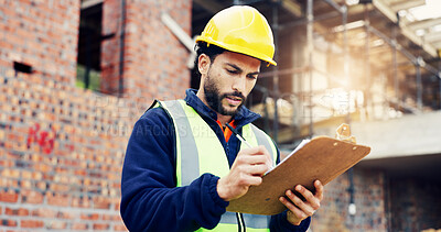 Buy stock photo Man, architect and writing with clipboard on construction site for building inspection or security. Male person, contractor or civil engineer with checklist, notes or hard hat for architecture safety