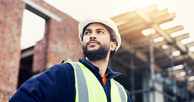 Buy stock photo Man, engineer and low angle with thinking in city, helmet and urban solution at construction site. Person, architect and perspective for project with infrastructure inspection and decision in Mexico