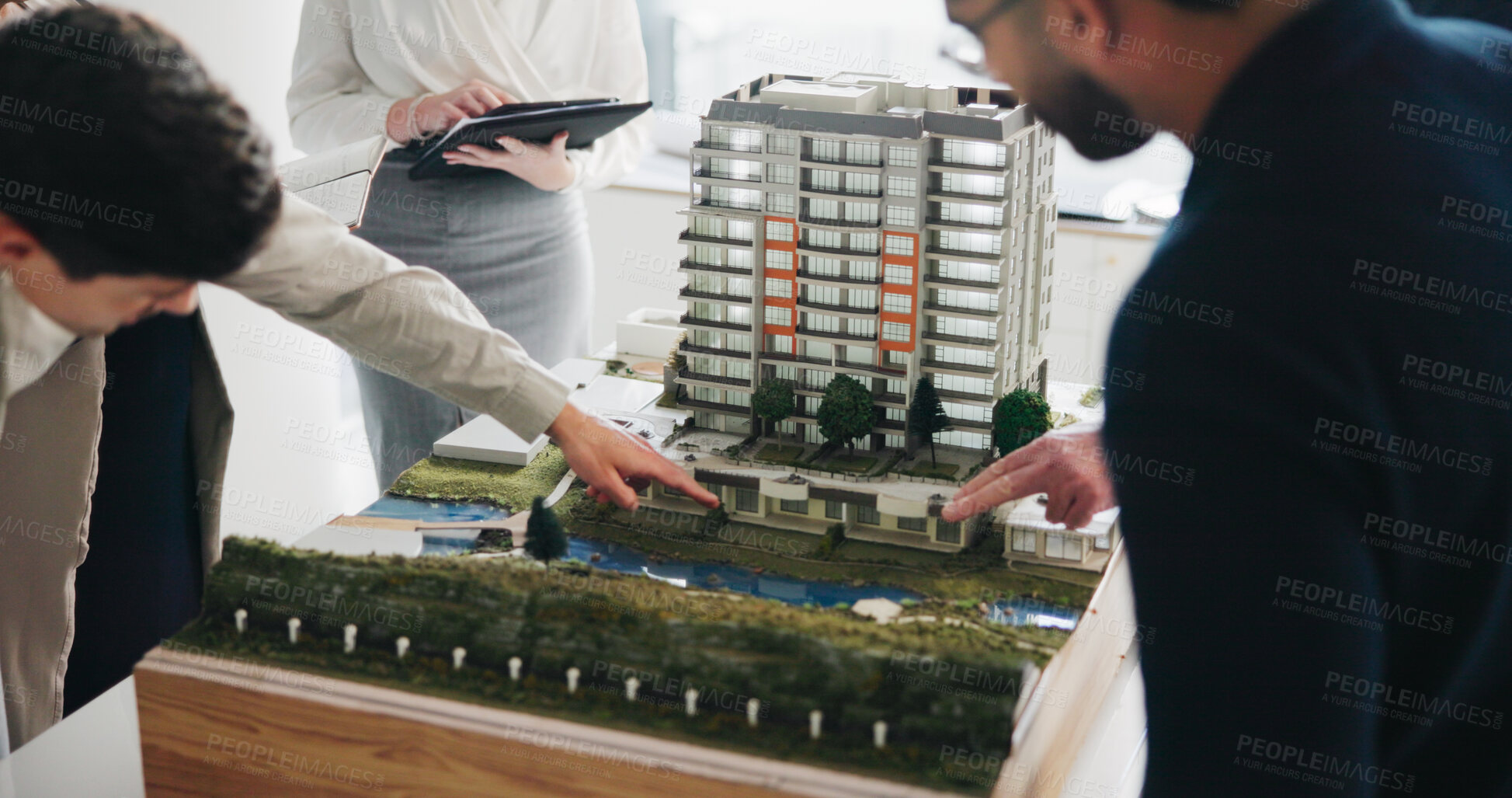Buy stock photo Property development, meeting and people in office with model, feedback or discussion in design review. Building, layout or architects with prototype, structure plan or team evaluation on investment.