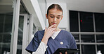 Reading, tablet and thinking with nurse woman in hospital at night for healthcare or medical review. App, report and research with thoughtful student in dark clinic for internship or residency