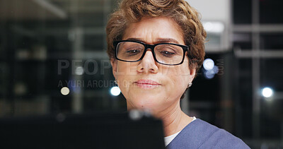Buy stock photo Glasses, reading and tablet with nurse woman in hospital at night for healthcare or medical results. App, eyewear and research with person in dark clinic for agenda, digital calendar or schedule