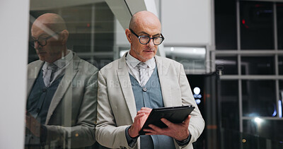 Buy stock photo Businessman, scroll and research on tablet at night, investment banking and project deadline on web. Mature person, working late and business analyst with info, serious and financial review with tech
