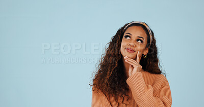 Buy stock photo Thinking, space and woman in studio with ideas, problem solving or brainstorming on decision. Choice, planning and female person by blue background with solution, memory or reflection for question.