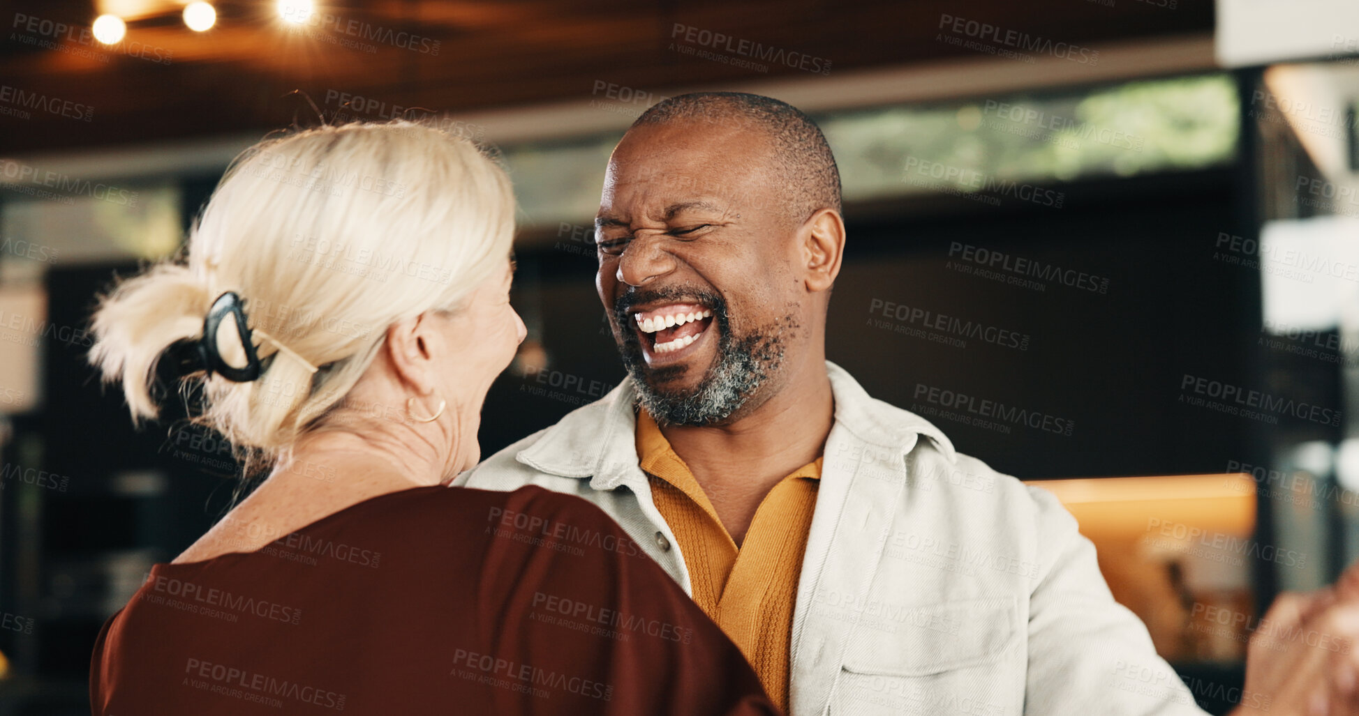 Buy stock photo Couple, laugh and holding hands in home for dancing, support and romance for anniversary. Happy, interracial mature people or rhythm at house with partner, listening to music and romantic celebration