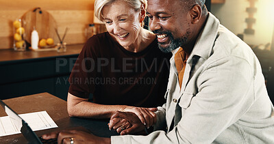 Buy stock photo Interracial couple, laptop and smile with budget in home for mortgage, bills or investment. Mature man, woman and paperwork with tech for financial planning, expenses documents or loan together