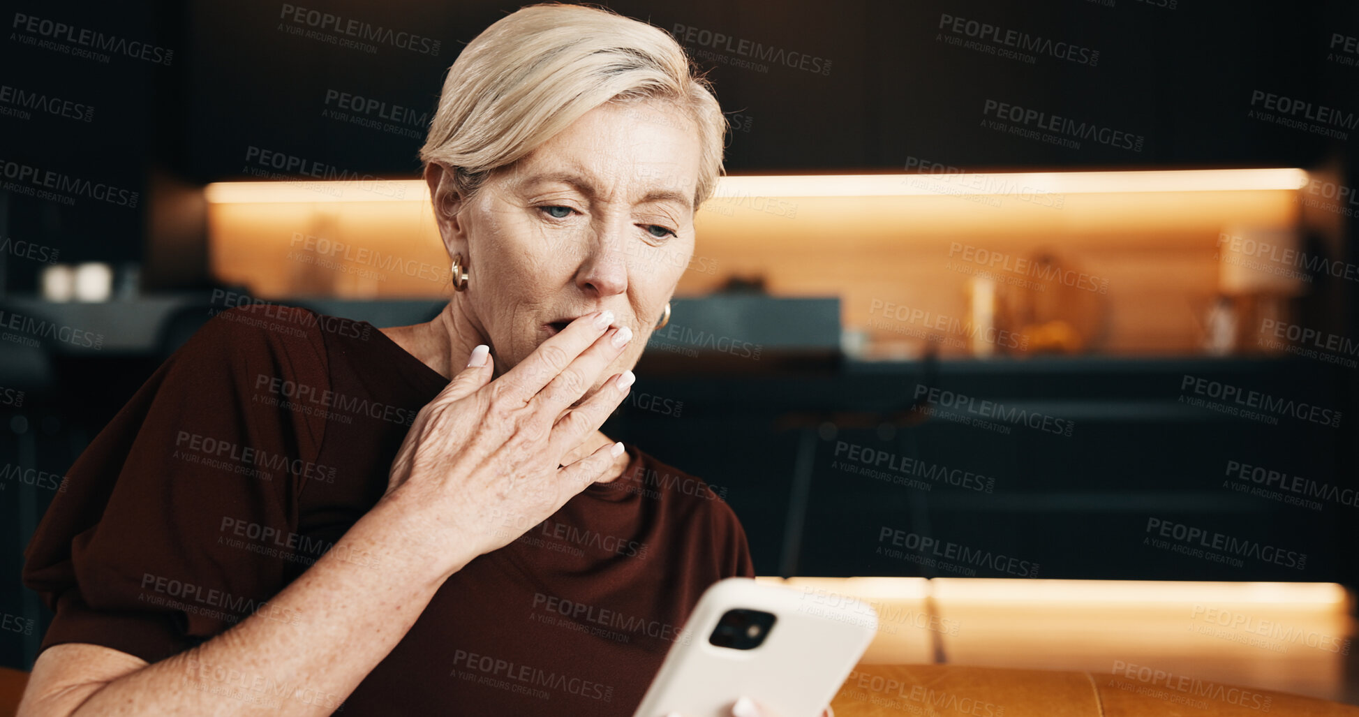 Buy stock photo Shocked, woman and texting with phone, home and communication with contact or gossip on social media. Reading, news and mature person with mobile in living room, surprised and networking on website