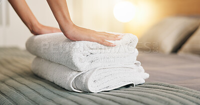 Buy stock photo Hands, towel and woman making bed in hotel for daily routine, fresh fabric or maintenance. Change, cleaning and tidy with person in bedroom of accommodation for chores, housework or responsibility