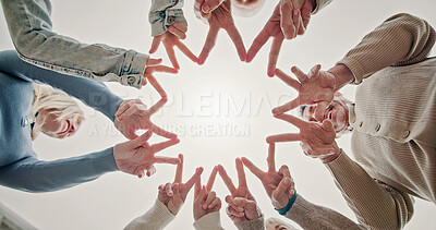 Buy stock photo Family, unity or hands together with peace sign of people below for synergy, mission or solidarity. Low angle, community group or trust with symbol emoji or shape for cohesion, inclusion or gathering