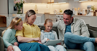 Buy stock photo Game, happy or family on sofa with tablet, bonding moment or help with online activity. Support, parents or children in house with tech, playing together or digital puzzle in loving connection.