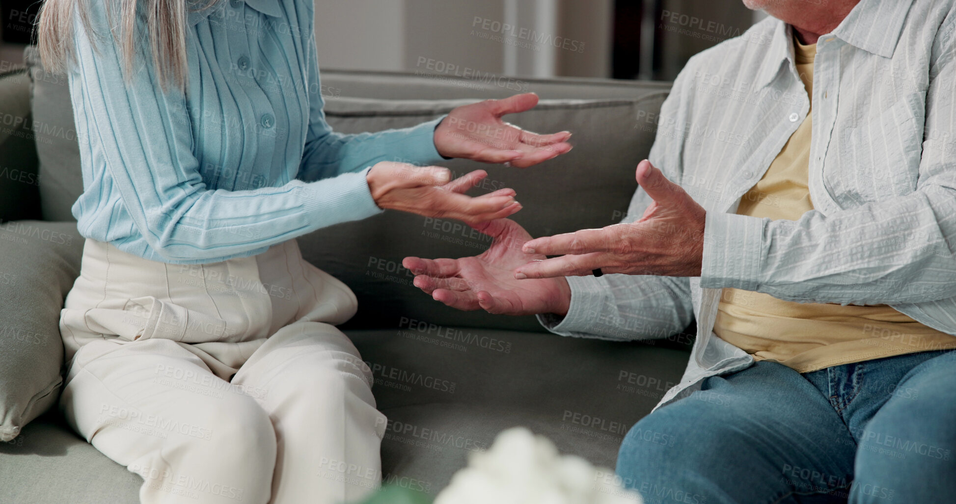 Buy stock photo Couple, hands and argument on sofa in home discussion with conflict for fight or disagreement. Relationship, divorce or people in living room dispute for confession, marriage or therapy in house