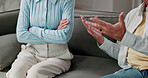 Couple, hands or complaint on sofa in home discussion with conflict for argument or disagreement. Relationship, breakup or people in living room dispute for confession, marriage or confront in house