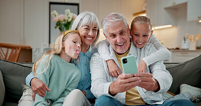 Buy stock photo Family, grandparents or selfie with kids in home for bonding, memory or capture moment together. Grandpa, grandma or happy grandchildren with picture for photography or social media on sofa in house