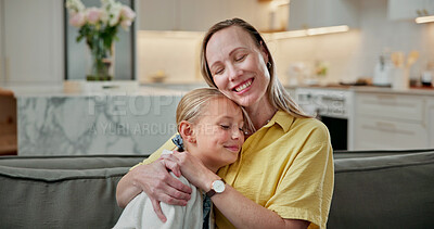 Buy stock photo Hug, happy and mom with child on sofa in home for bonding, love and trust on weekend together. Smile, connection and mother embracing girl kid in living room for relax, safety and family in house.