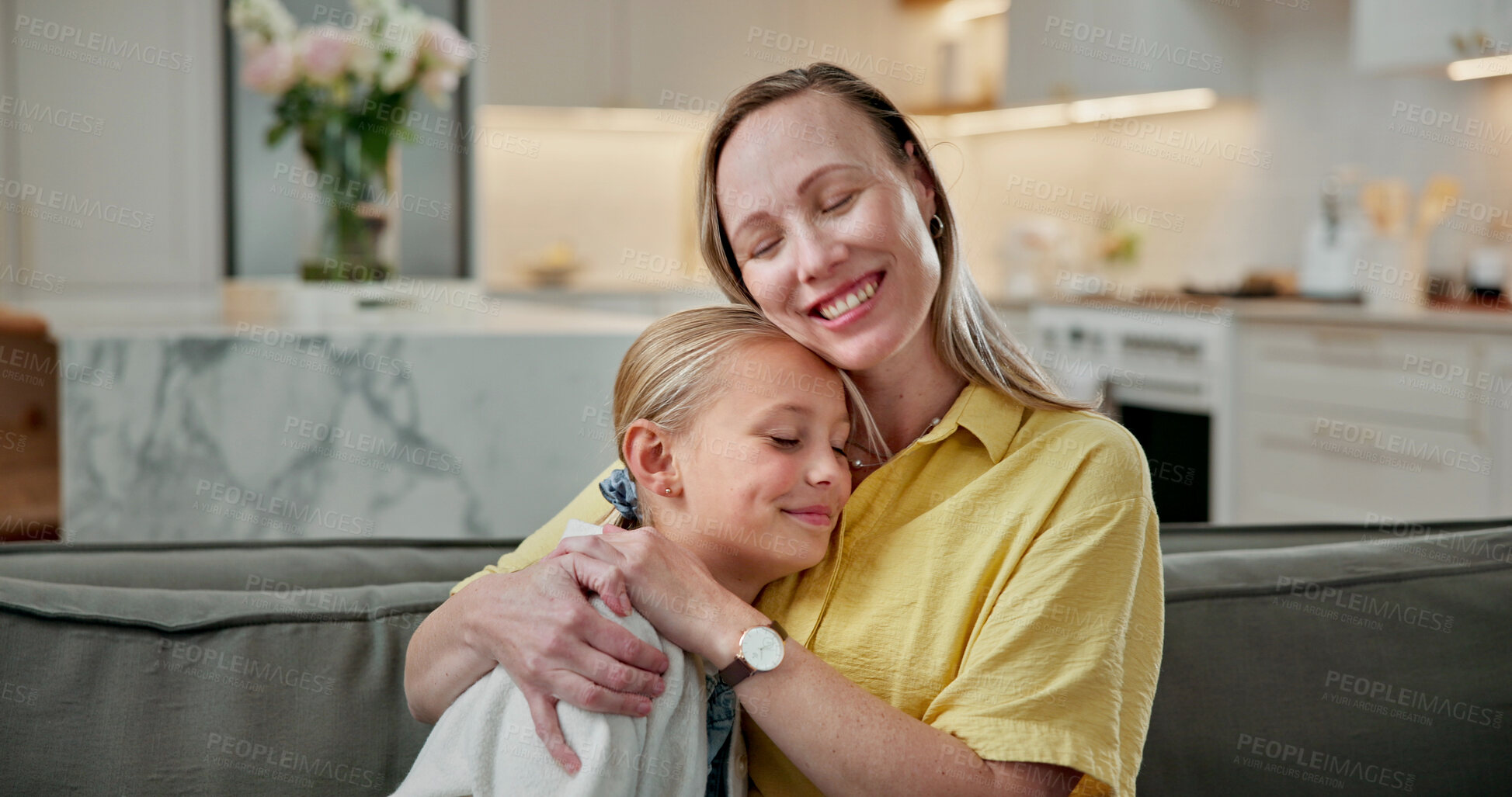 Buy stock photo Hug, happy and mom with child on sofa in home for bonding, love and trust on weekend together. Smile, connection and mother embracing girl kid in living room for relax, safety and family in house.