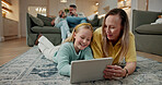 Mother, child and play in house with tablet, family bonding together and online gaming for education. Happy, woman and daughter in lounge with tech, entertainment and parent help for learning game.