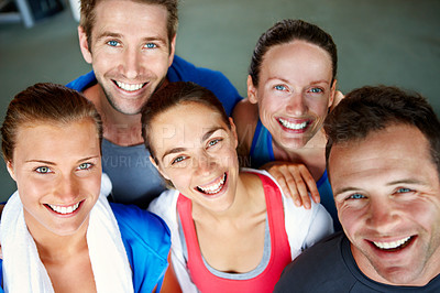 Buy stock photo Close-up shot of a small group of men and women in sports clothing