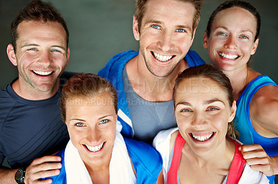 Buy stock photo Close-up shot of a small group of men and women in sports clothing