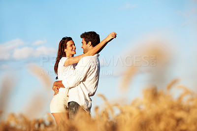 Buy stock photo Travel, couple and happy with hug in wheat field for honeymoon trip, nature romance or trust. Love, people and embrace in countryside for anniversary getaway, bonding together or healthy relationship