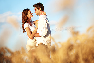 Buy stock photo Smile, hug and care with couple in field for spring date, honeymoon getaway and bonding. Trust, holiday and connection with man and woman in countryside for romance, travel vacation and love