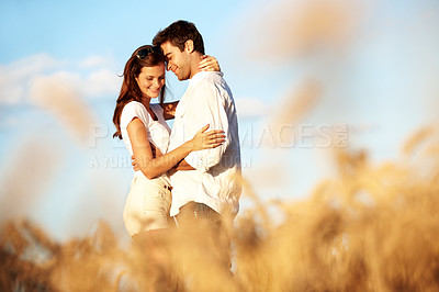 Buy stock photo Holiday, trust and happy couple with hug in wheat field for honeymoon trip, nature romance or love. Travel, people and embrace in countryside for anniversary getaway, bonding and marriage connection