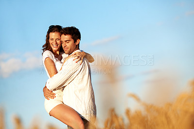 Buy stock photo Love, hug or couple in countryside with trip, happy moment or bonding on summer break. Eyes closed, space or people in field with carrying, romantic connection or healthy relationship in outdoor date