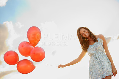 Buy stock photo Balloons, woman and portrait with smile for freedom, vacation or happiness for travel fun. Low angle, girl and excited outdoor for weekend trip with holiday, confidence and celebration for adventure